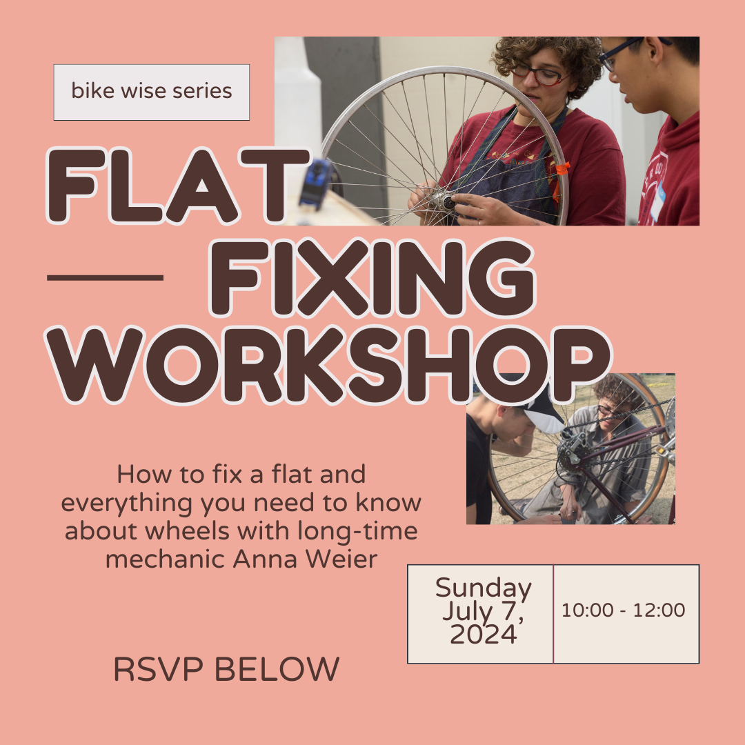 Flat fixing workshop on July 7th 2024. People pictured working on a bike wheel