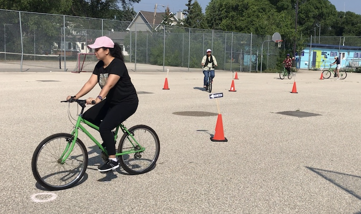WOMEN LEARNING TO RIDE